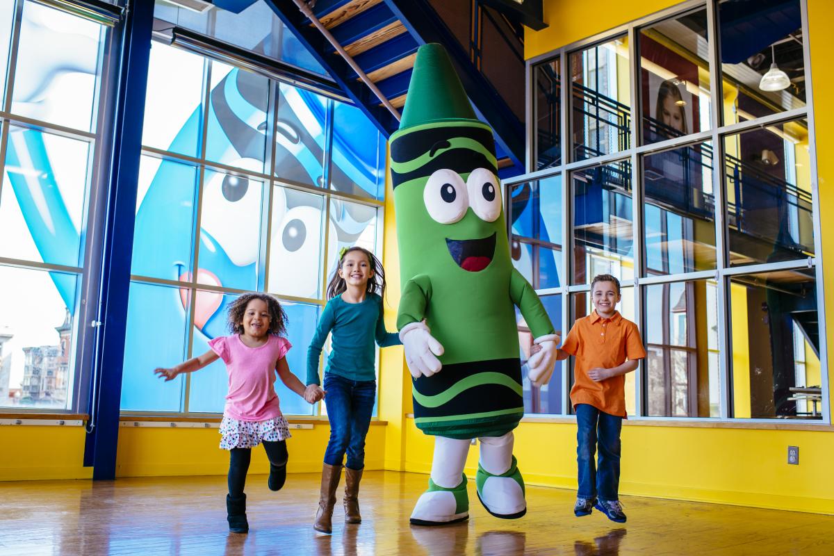 Crayola Experience kids with Crayon Mascot