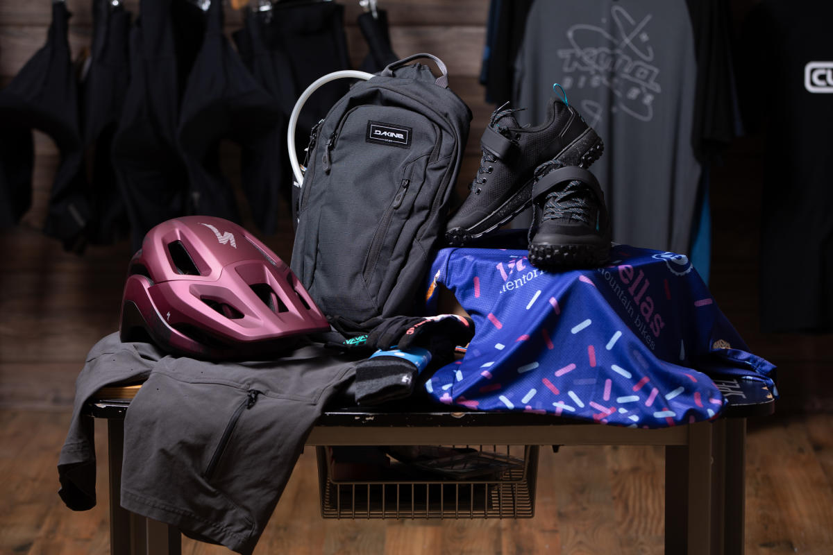 A helmet, backpack, and sneakers for sale at Cutters Bike Shop in Bethlehem.