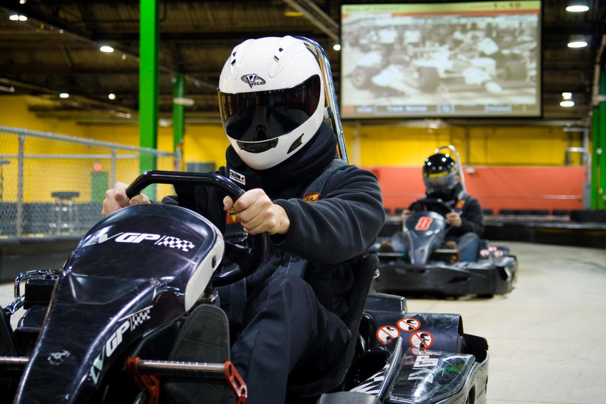 Racers sitting in go-karts wearing helmets at the Lehigh Valley Gand Prix