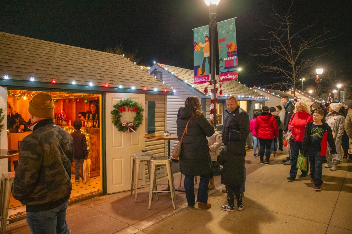 Shoppers at Candy Cane Lane at Promenade Shoppes in Center Valley