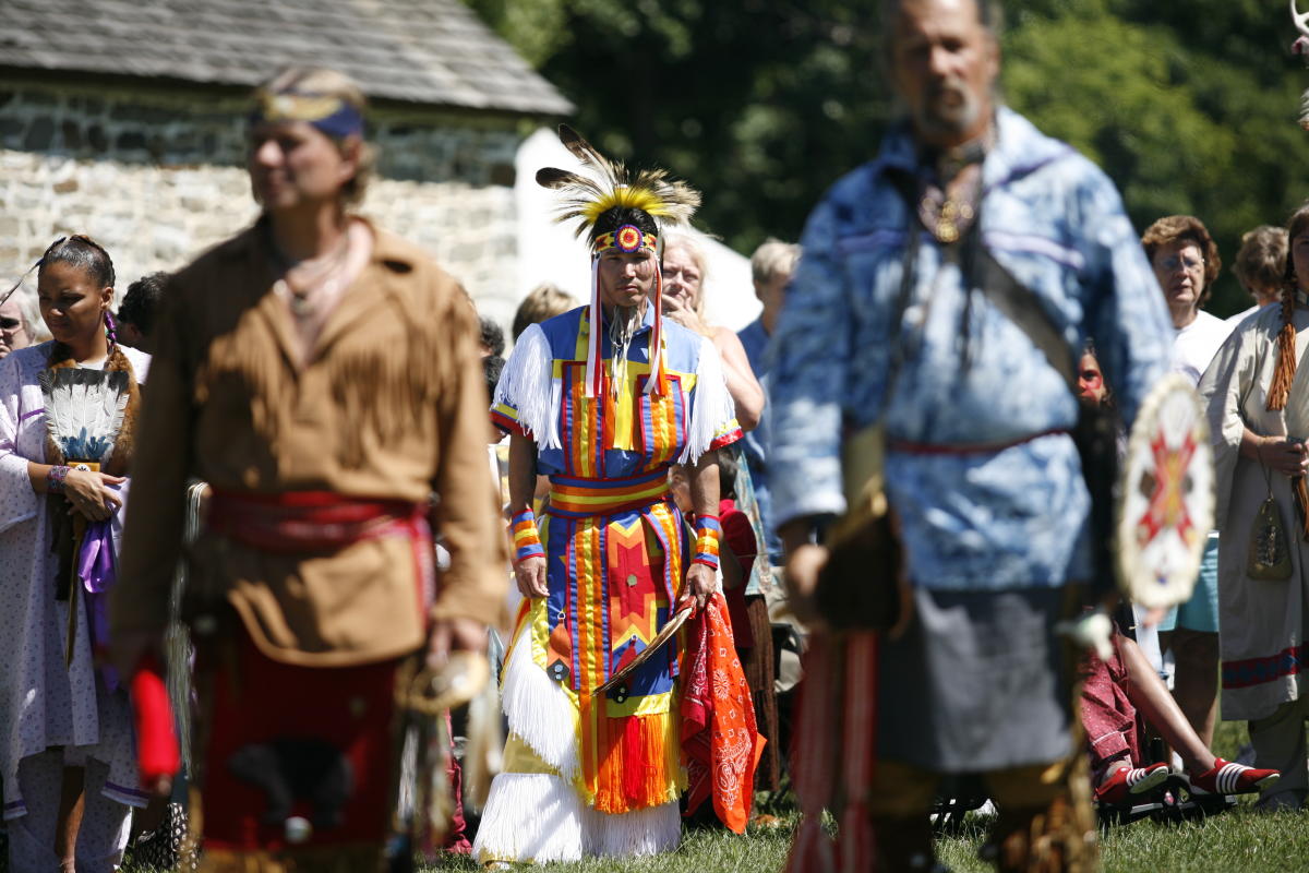 Performers in Native American dress at the Roasting Ears of Corn Festival