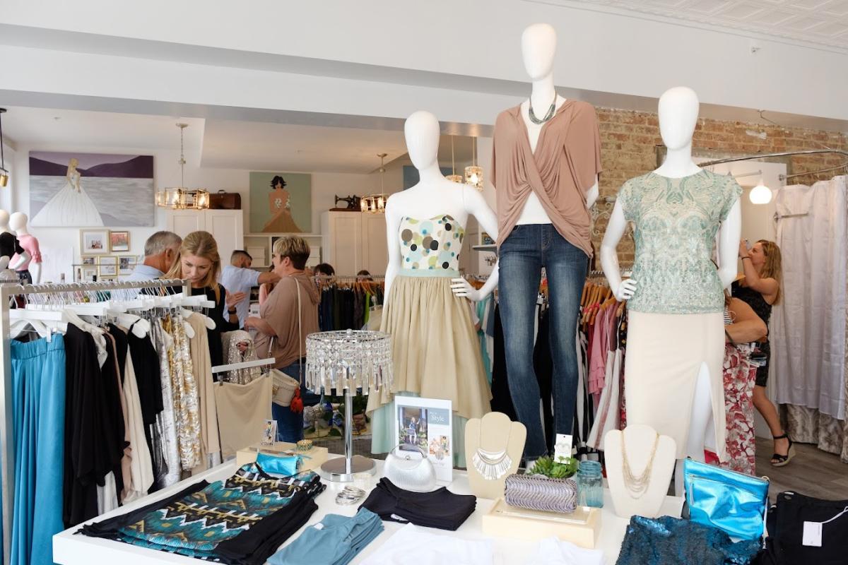 Unique fashion designs displayed on mannequins in a busy boutique - Lara Bly Designs in Bethlehem, PA