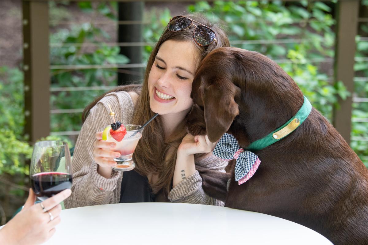 Parkwoods Woman with Drink and Dog