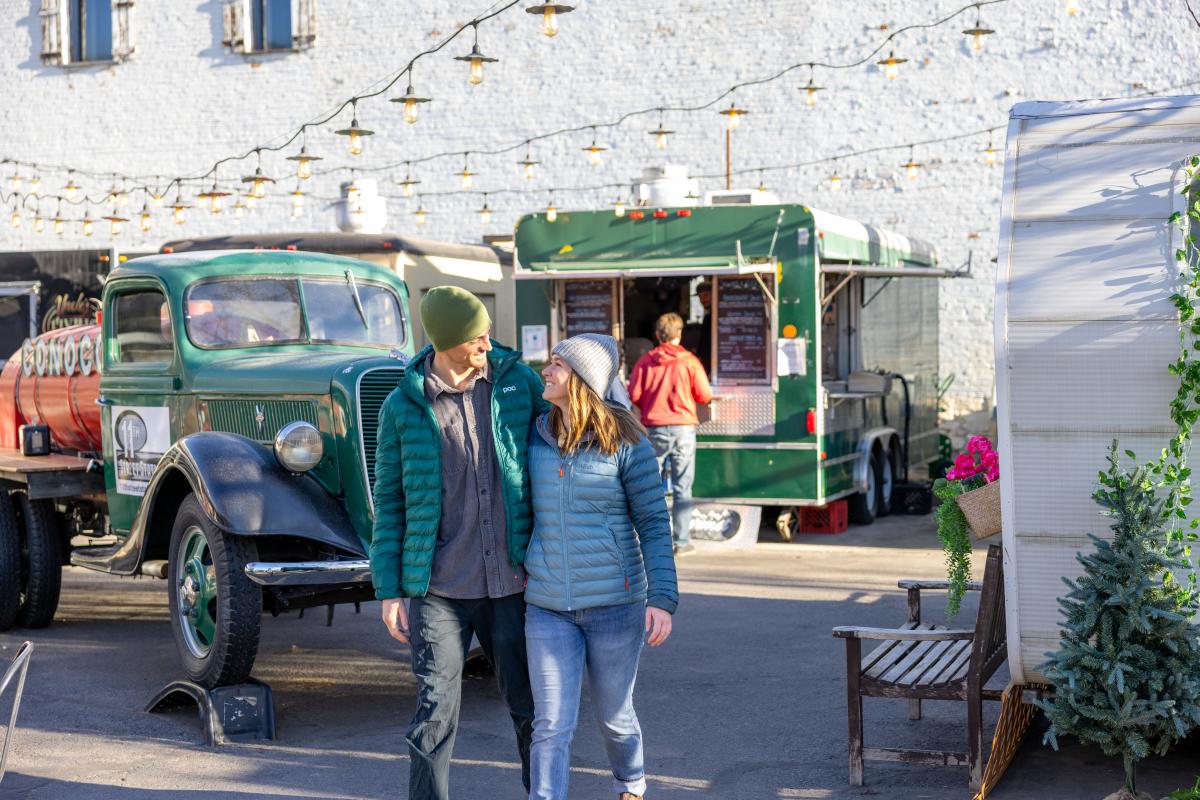 A couple laughing at 11th Street Station during Winter
