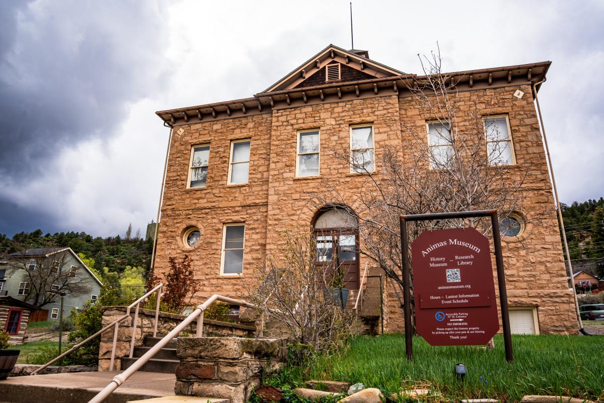 Exterior of the Animas Museum during a storm.