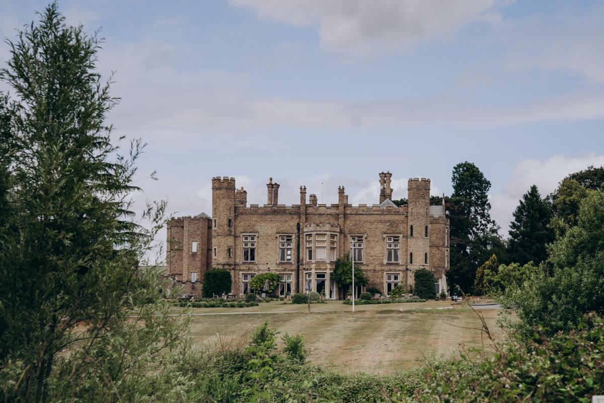 exterior of cave castle hotel with the grounds