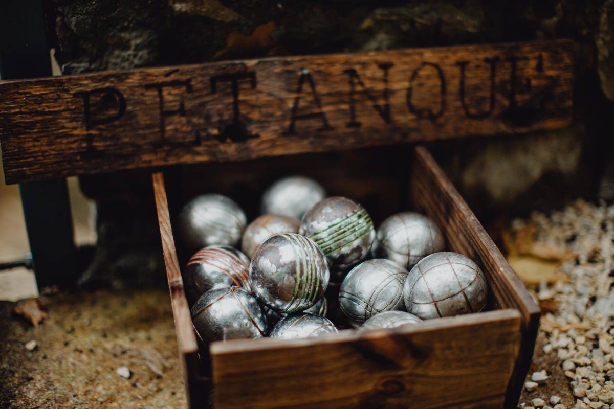 A wooden box of Pétanque balls