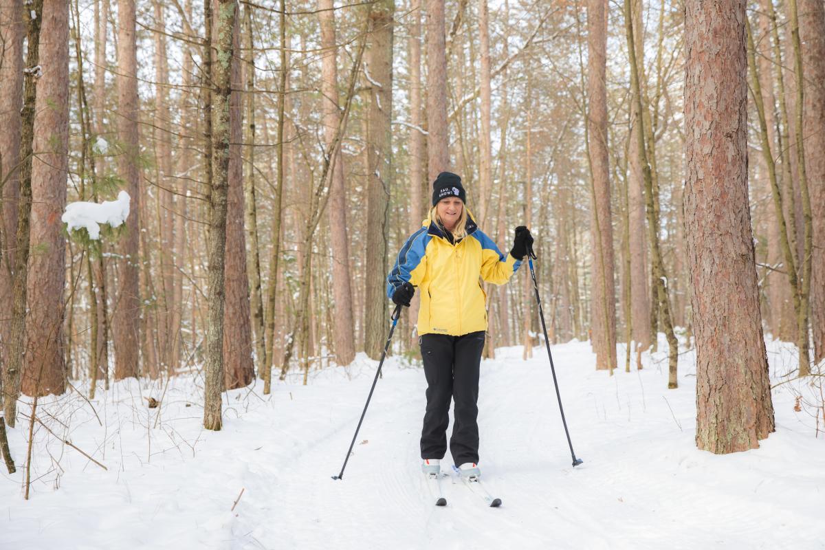 A woman cross country skiing at Beaver Creek Reserve