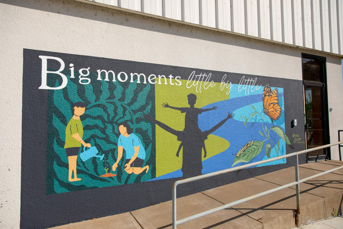 A mural outside the Big Brothers Big Sisters building, presented by Scheels