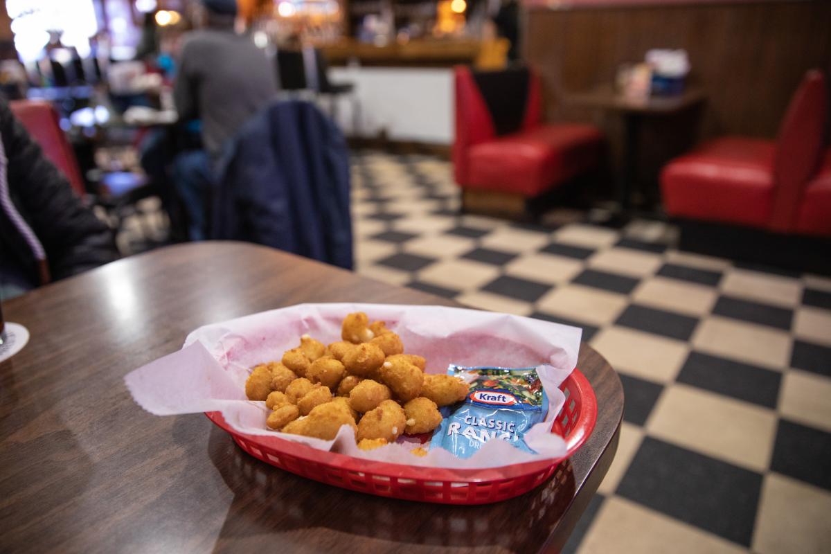 Court'n House cheese curds served with a packet of ranch