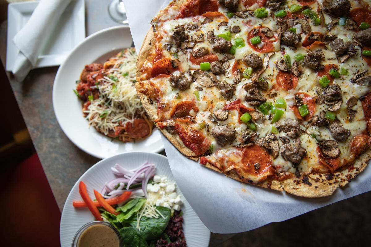 Pizza, pasta and salad served at Draganetti's