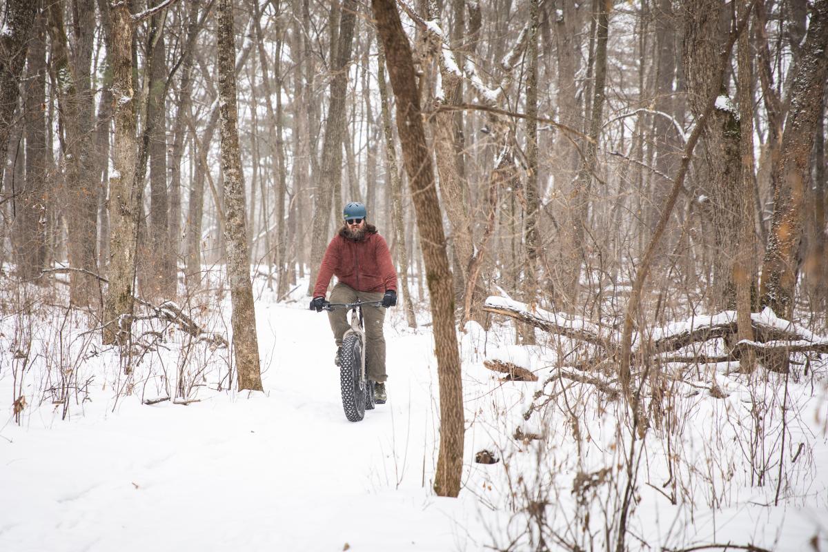 A man fat tire biking at Lowes Creek County Park