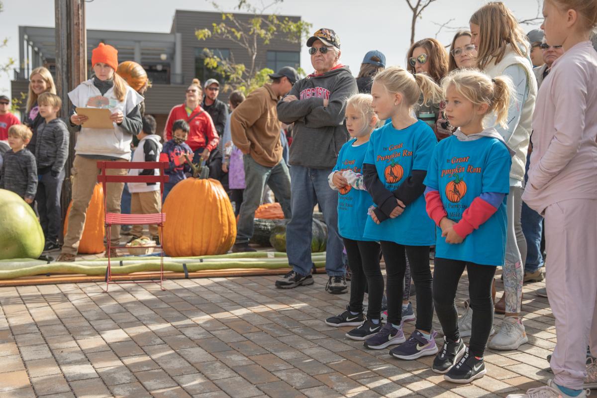 Kids and event attendees at River Prairie's Ginormous Pumpkin Festival