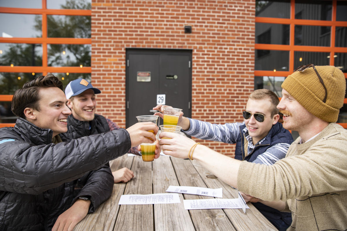 Group of guys drinking beers at the Brewing Projekt