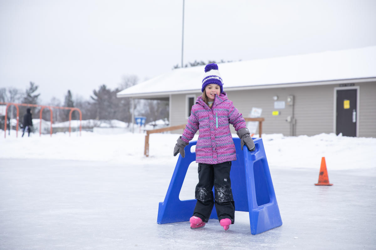 A young girl ice skating at Putnam Heights