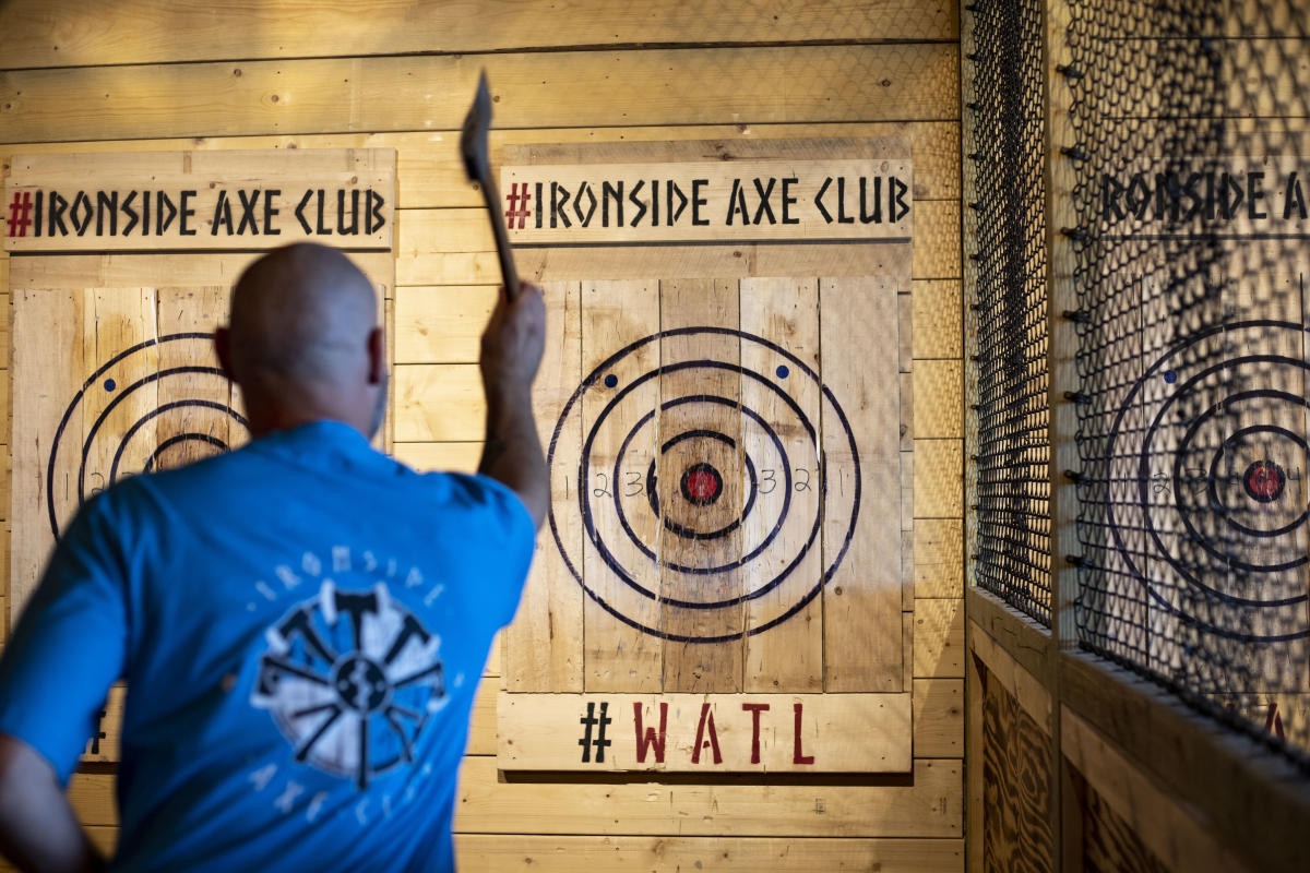 Man throwing axe at Ironside Axe Club