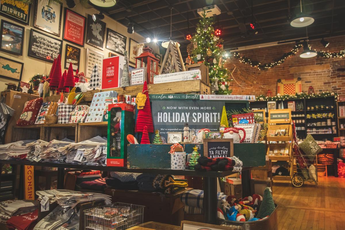 Inside the store at The Local Store showing holiday gifts, the Christmas tree, wall art, and more