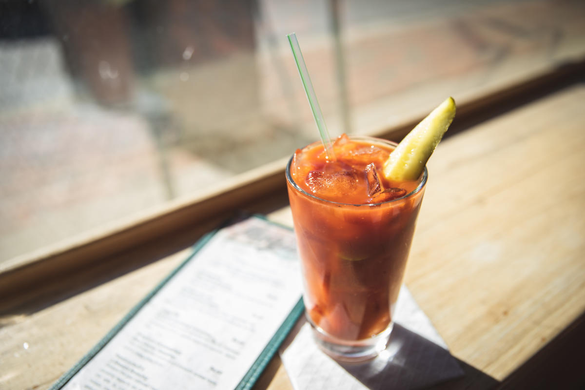 A Bloody Mary served in a glass with a pickle at Mogie's Pub