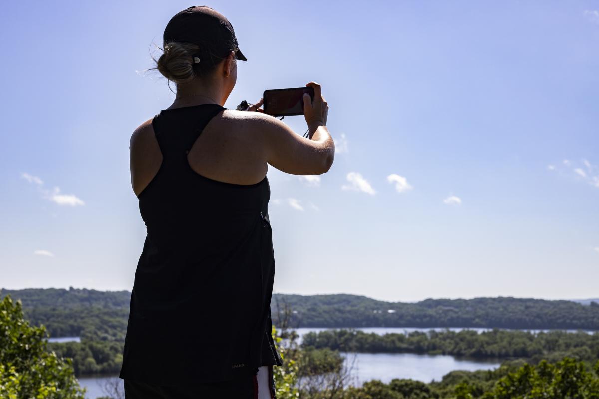 Taking a picture of the view on top of Mt. Simon