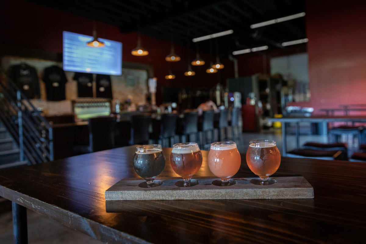 A flight of four beers served at Ombibulous Brewing Company in Altoona, WI