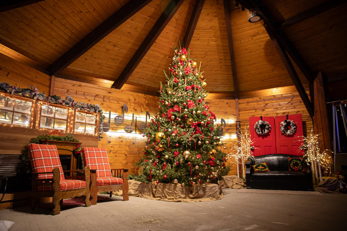 A Christmas tree and cozy chairs at the Garber Bandshell
