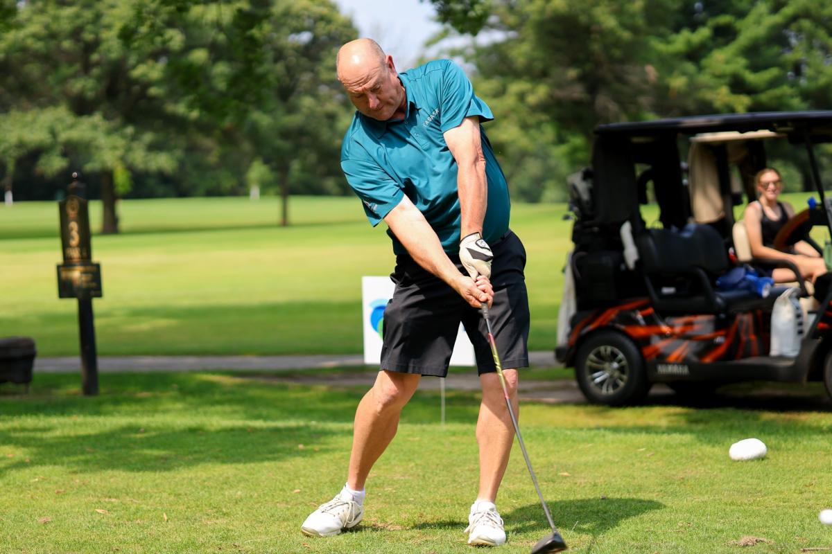 A man golfing at the Arcadia Country Club
