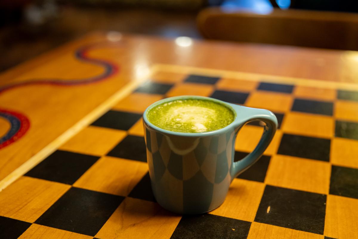 A mug of matcha at Racy D'Lenes