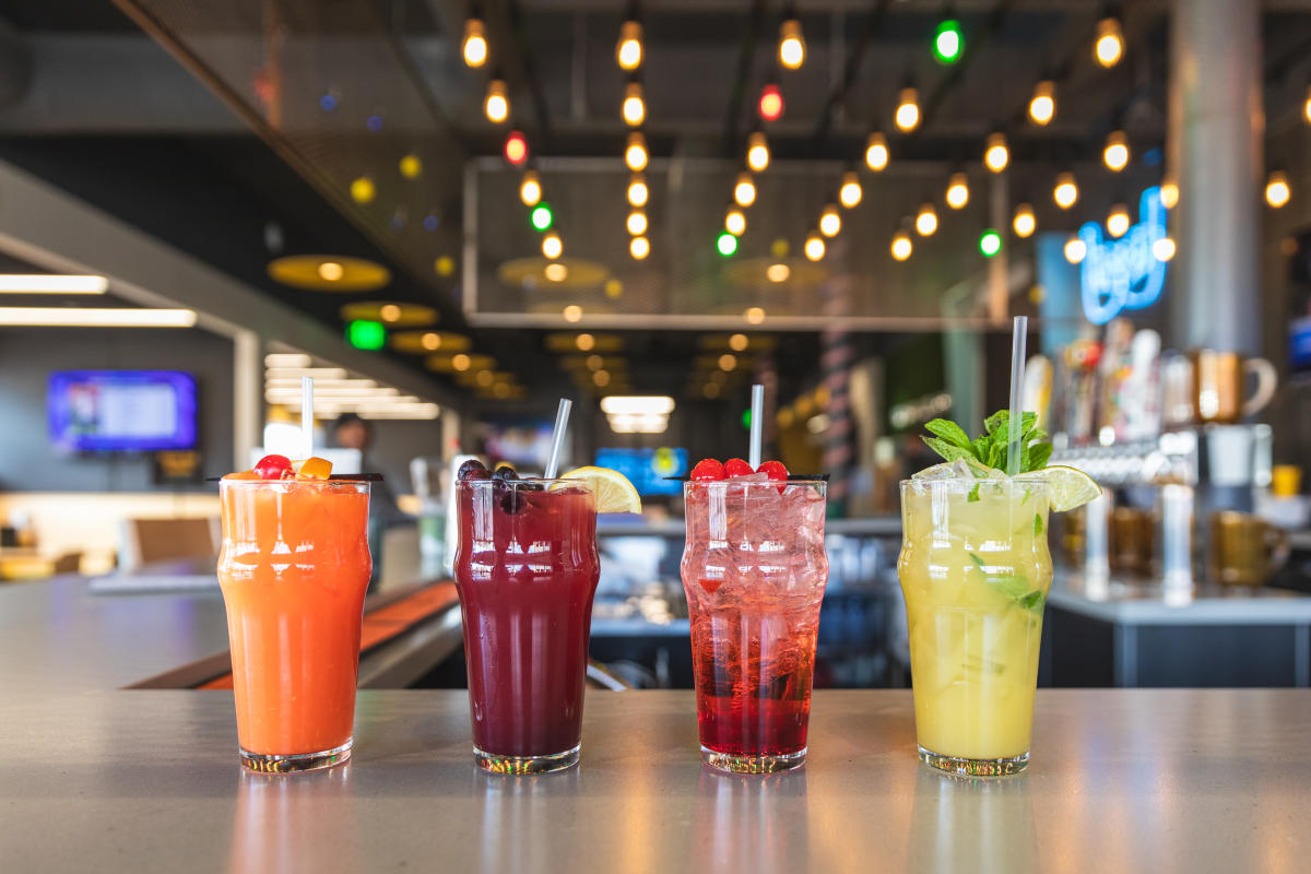 4 colorful mocktails on the bar at Reboot Social