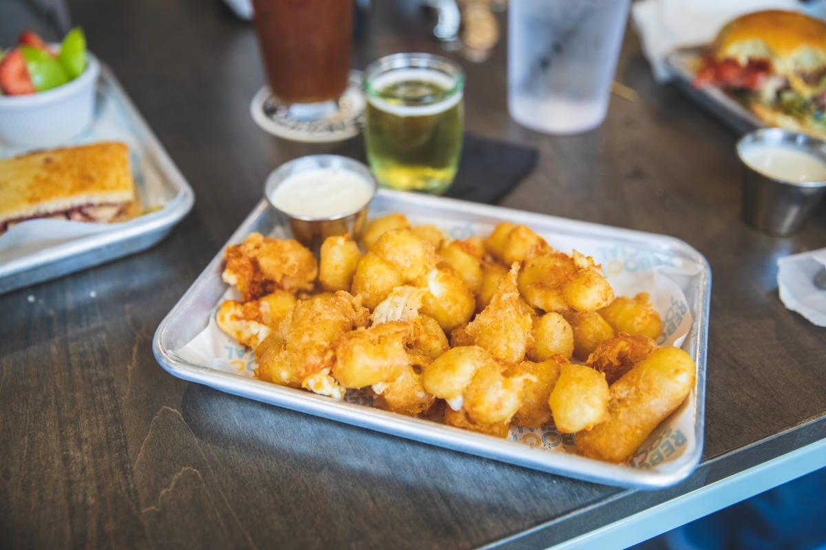 a tray of cheese curds at Reboot Social