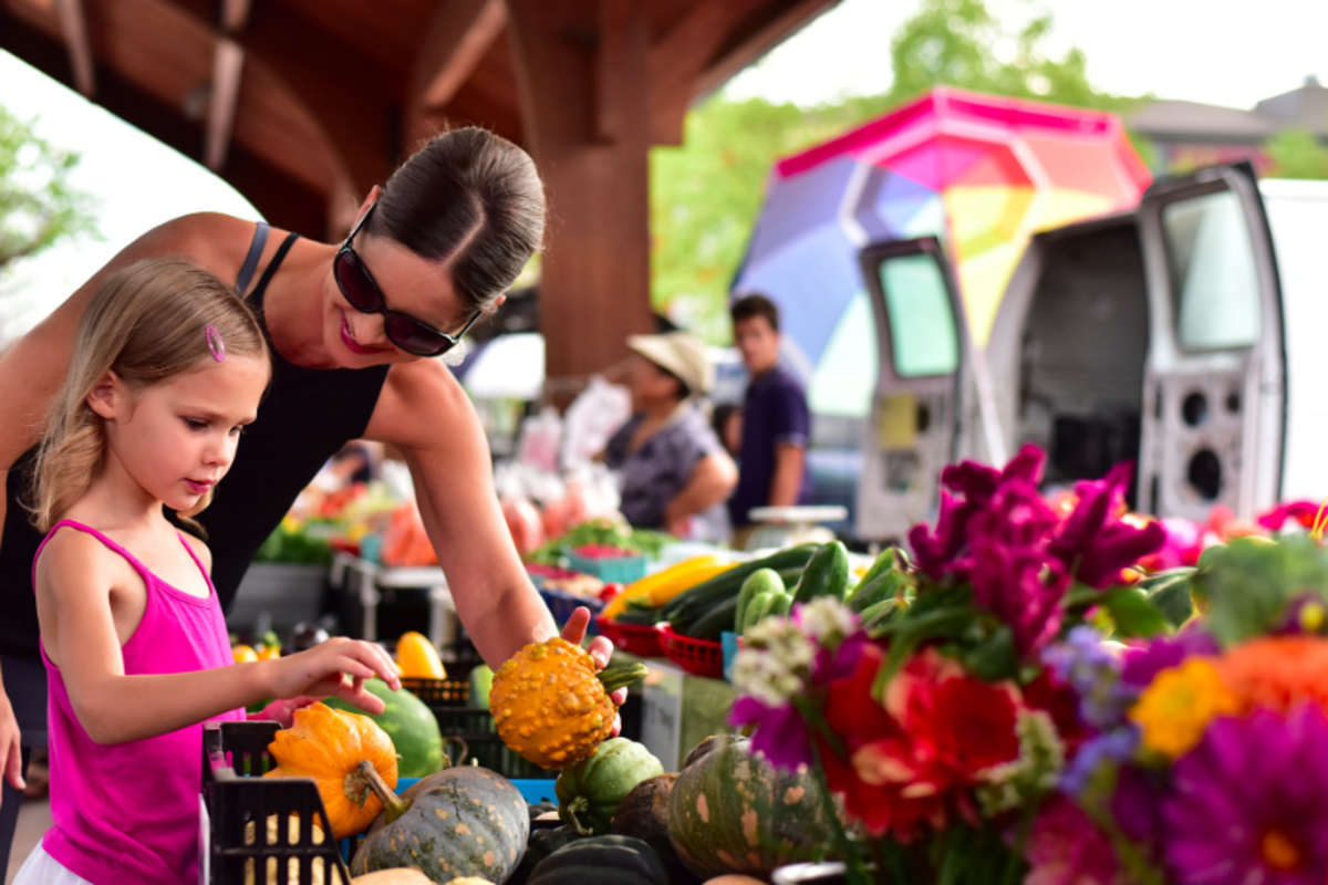 Flowers sold at the farmers market in Phoenix Park in downtown Eau Claire