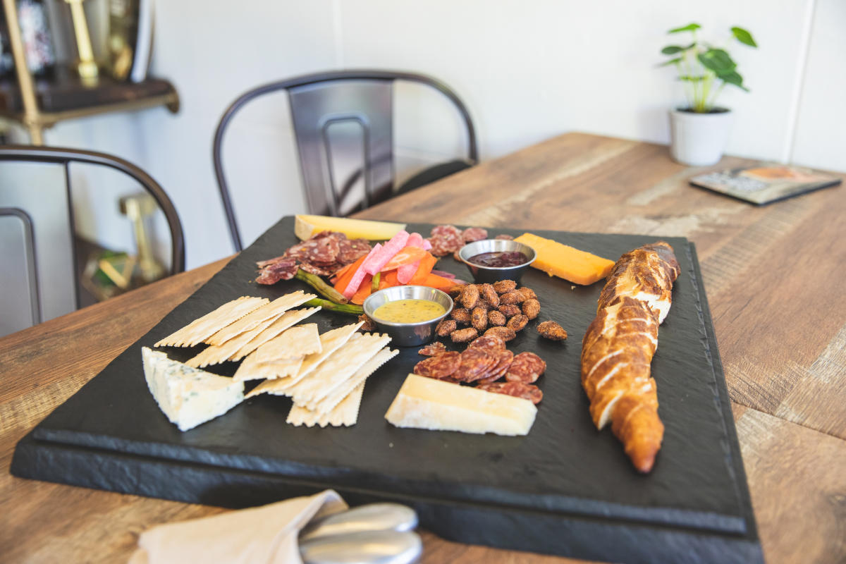 Charcuterie board featuring meat, cheese and crackers at 3rd & Vine in downtown Eau Claire