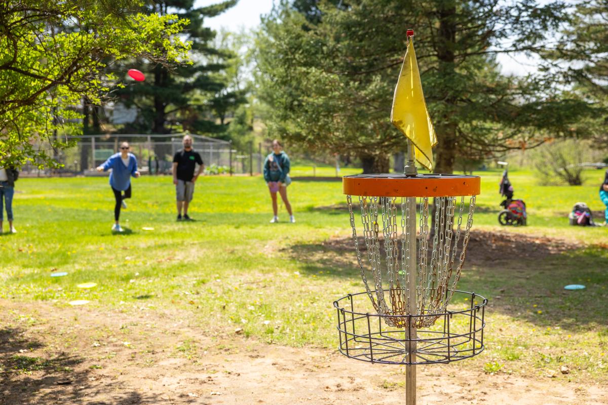 A group of people playing at Buckrub Disc Golf