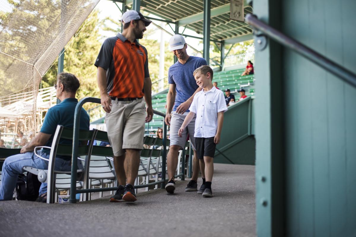 Father and son enjoy the Eau Claire Express MVP Signature Experience at Carson Park.