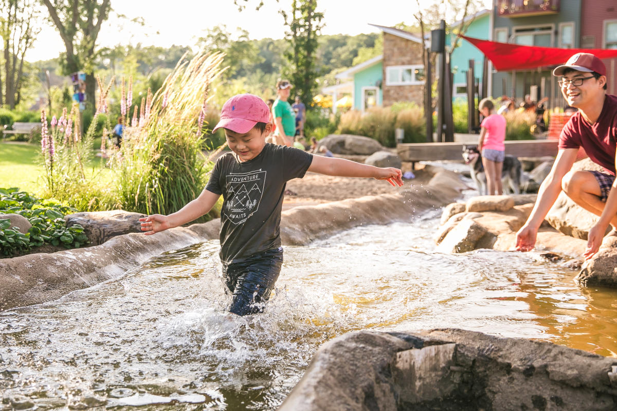 Playing in stream at River Prairie park in Altoona, WI