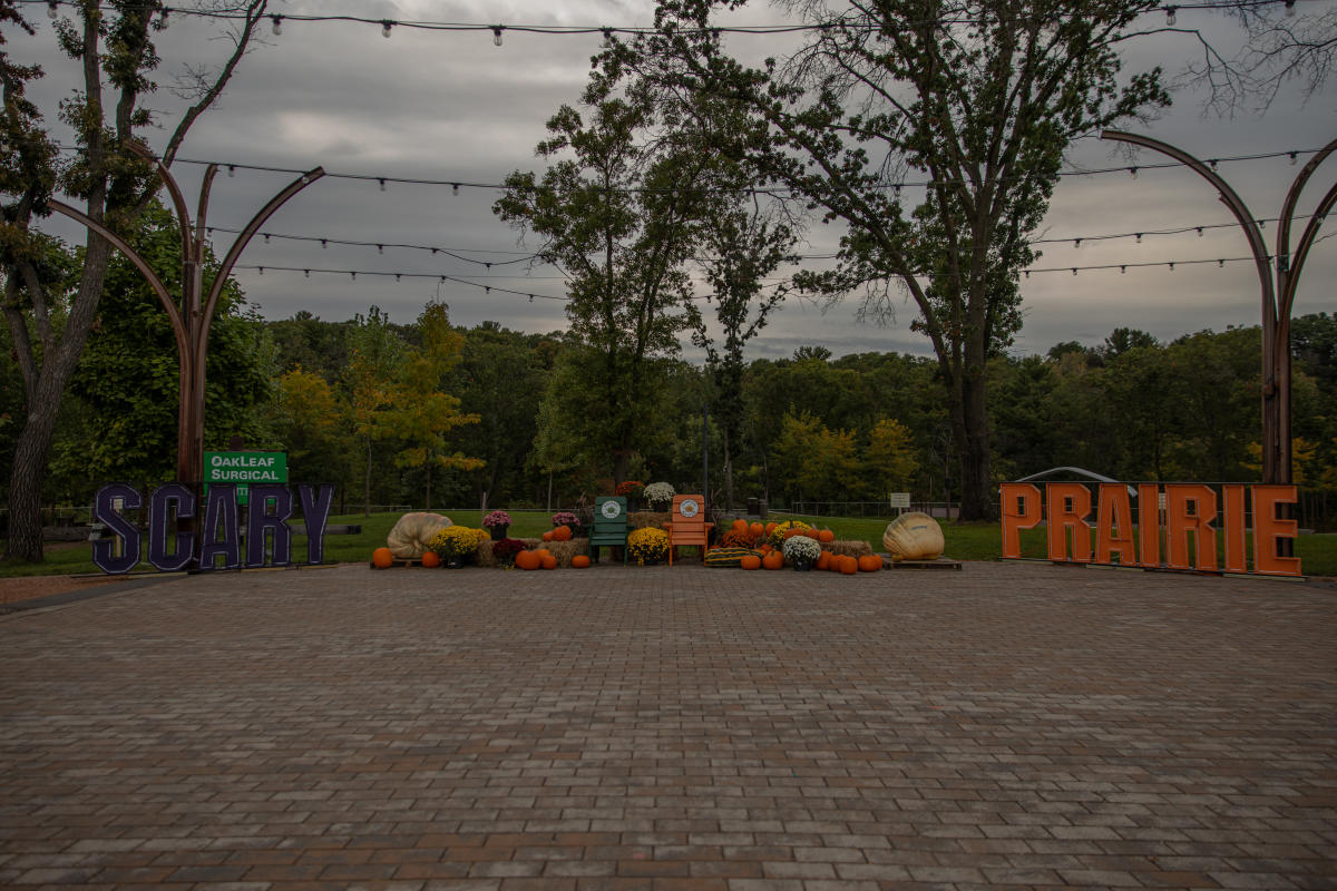 A sign that says "Scary Prairie" on the River Prairie Plaza