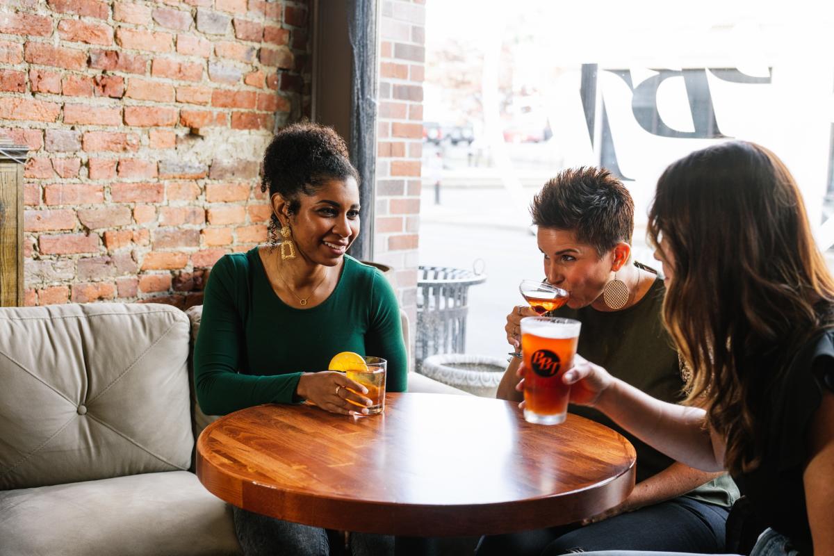 ladies drinking bourbon cocktails at BBT in downtown Elizabethtown