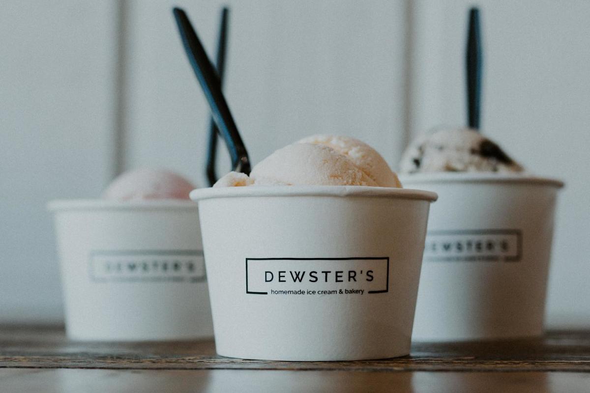 Three cups of Dewster's homemade ice cream in various flavors