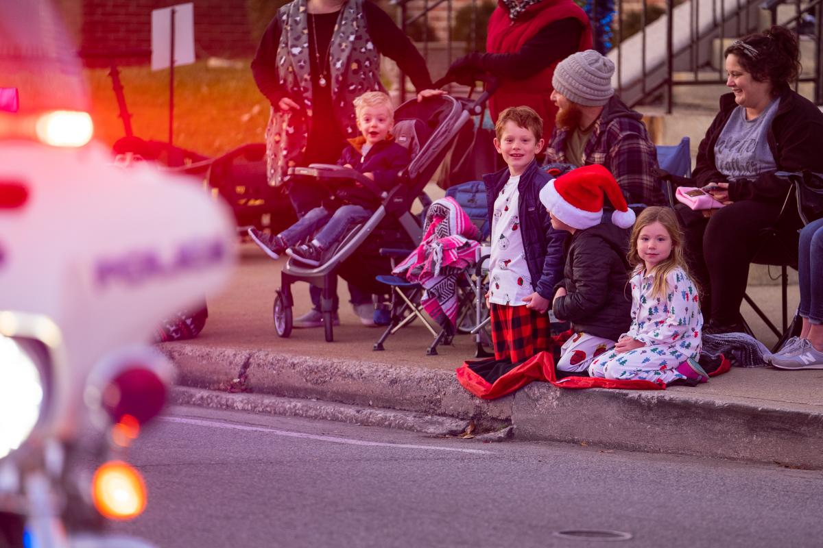people gathered on the street for light up downtown