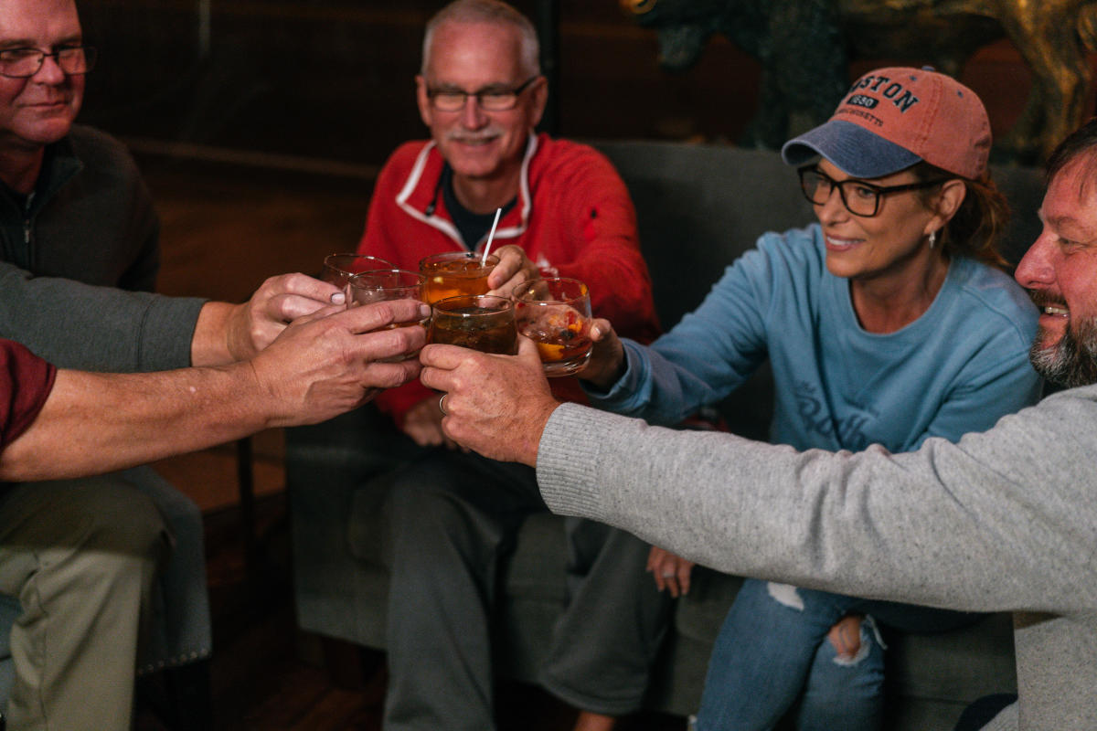 people saying cheers with drinks at BBT