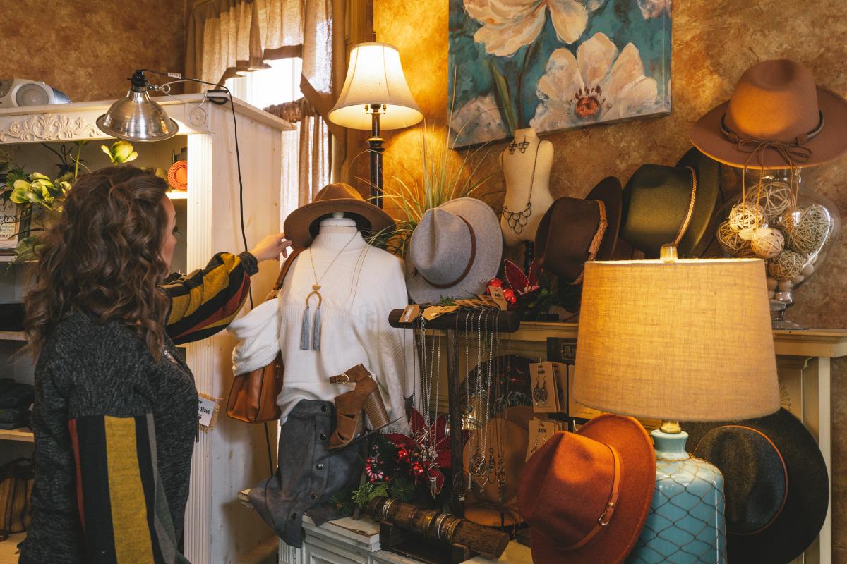 a woman browsing the collection at o'neals boutique