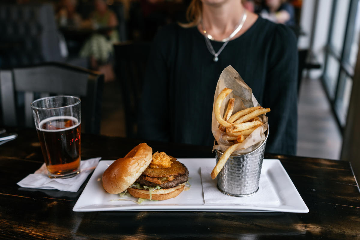 a gourmet burger and a beer from jr neighbors