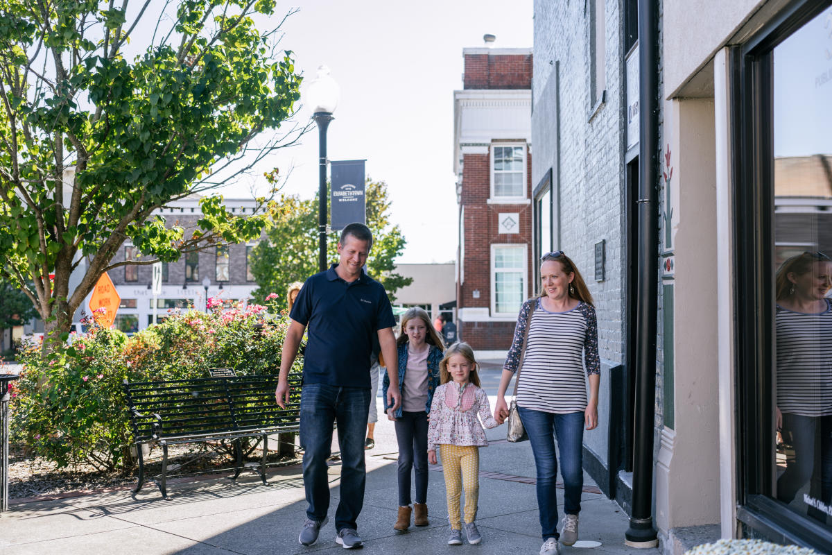 a family walking in downtown elizabethtown
