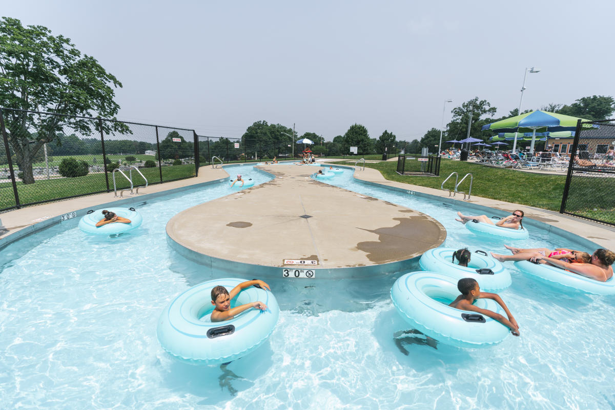 kids in inner tubes in the lazy river at the american legion water park