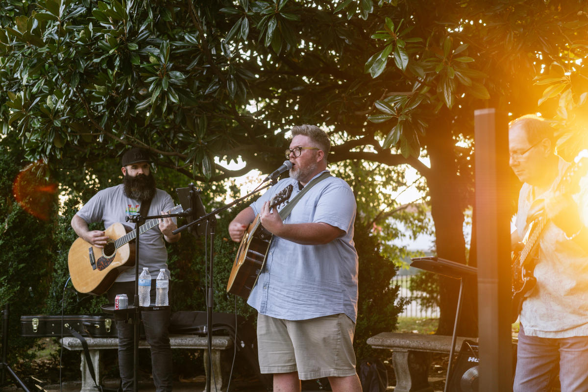 a performer singing at tavern in the garden