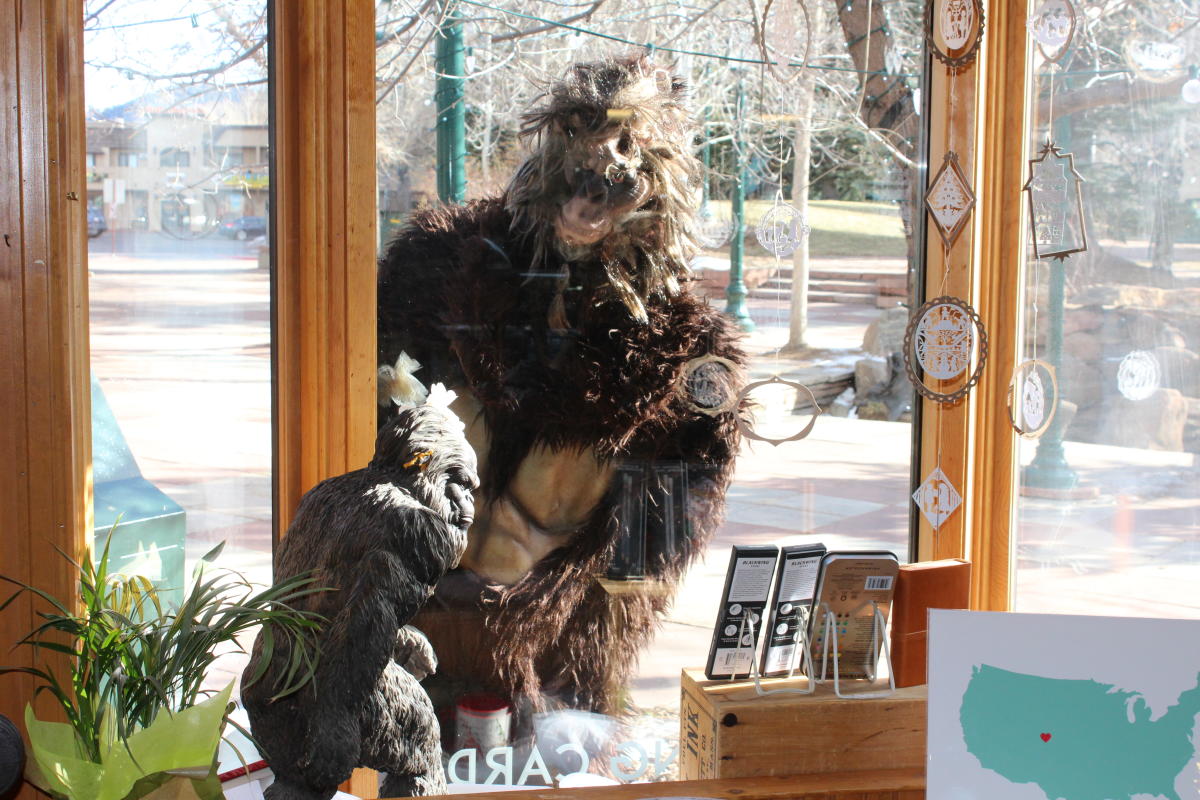 bigfoot looking in inkwell & brew's window