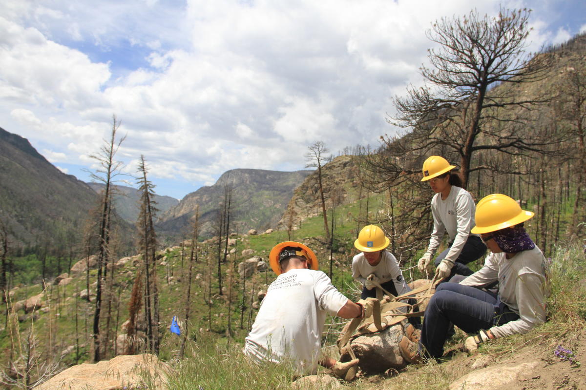 trail crews doing rock work to improve a trail