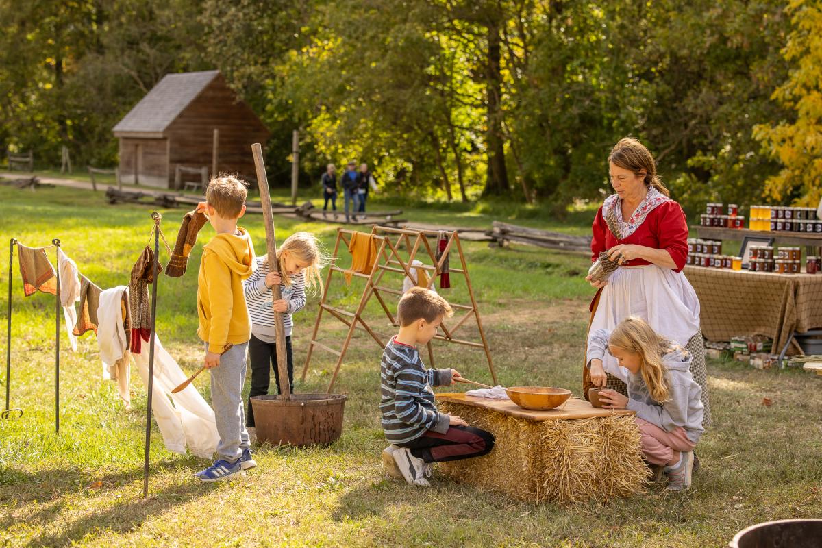 Kids learning farm practices.