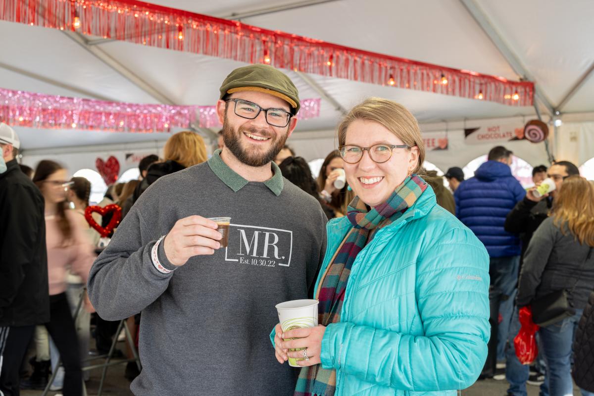 Couple sipping hot chocolate