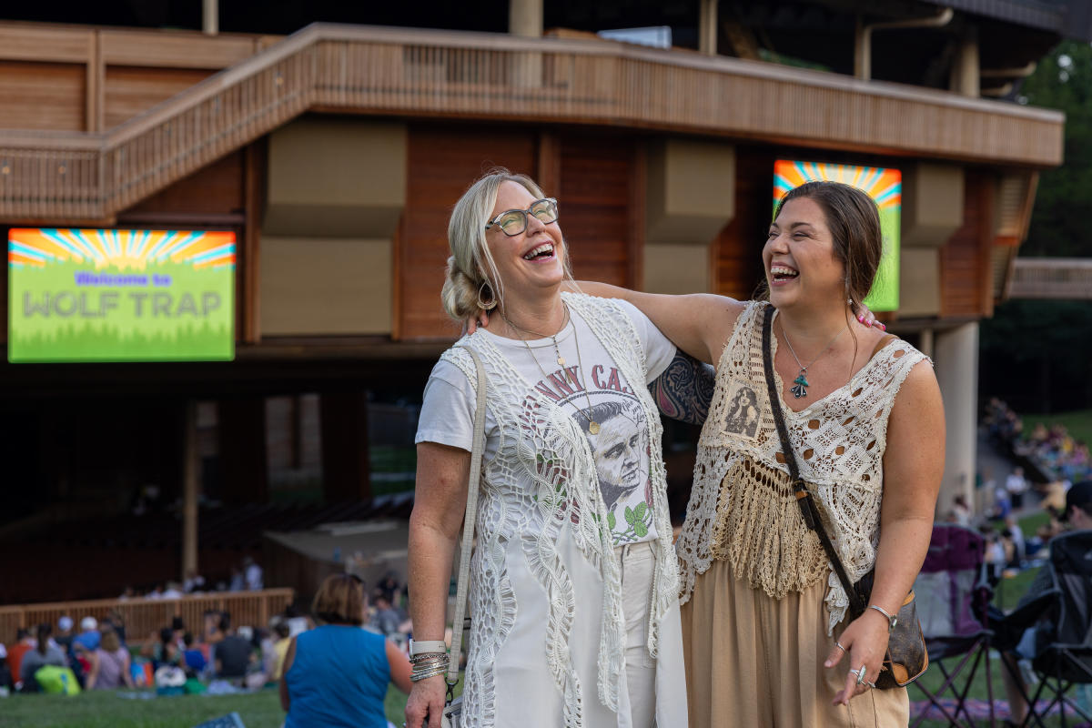 Two Women basking in laughter at Wolf Trap