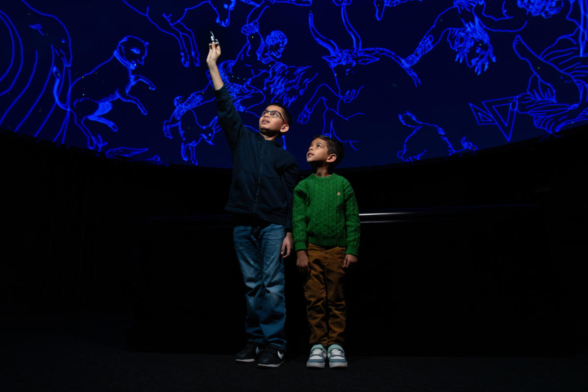 Children enjoying the planetarium at Science Central in Fort Wayne, Indiana.